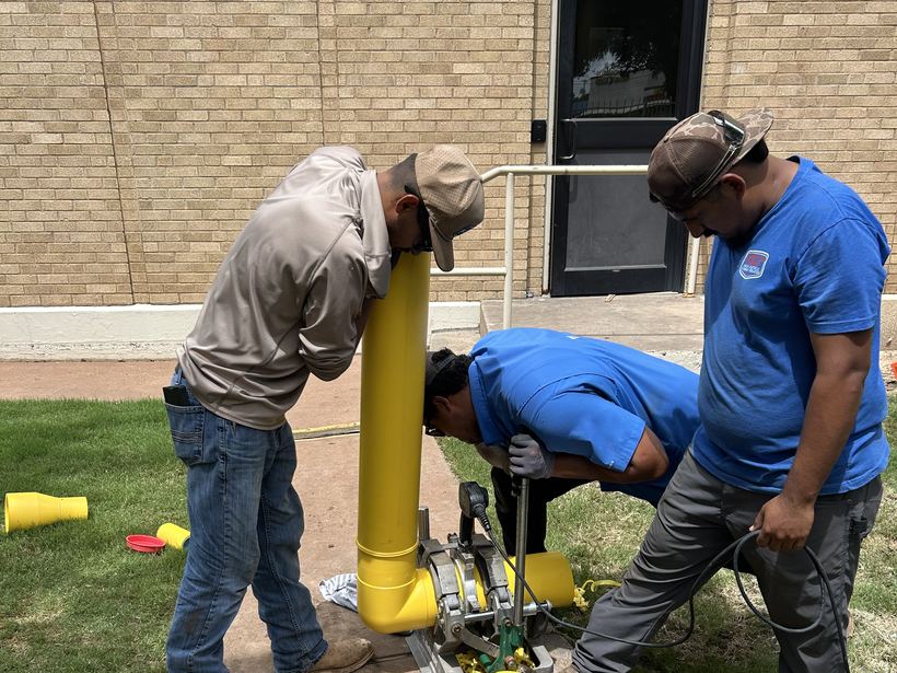 Double R crew fusing a gas line on a commercial job